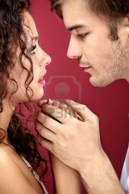 6328050-close-up--passionate-look-enamoured-on-a-red-background.jpg