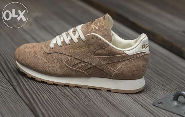 226952790_2_644x461_reebok-krossovki-zhenskie-classic-leather-exotics-matte-gold-fotografii.jpg
