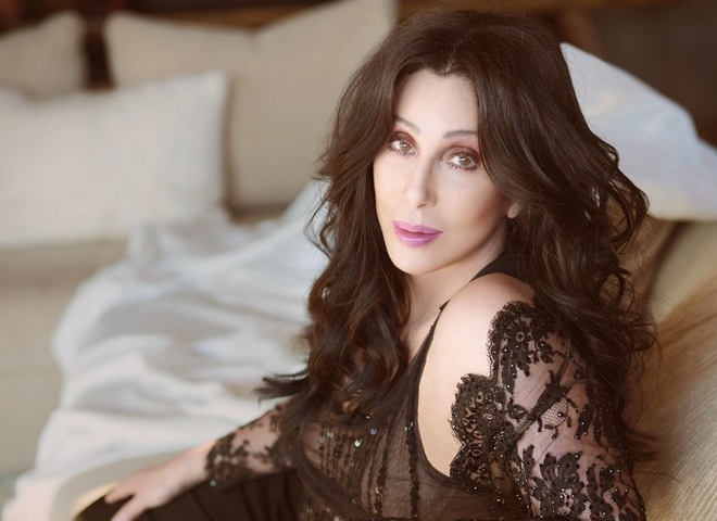 b53_cher_singer_modeling_sitting_couch_728x510.jpg
