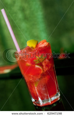 stock-photo-red-mojito-cocktail-with-energy-drink-strawberries-and-lemon-isolated-on-green-background-62947198.jpg